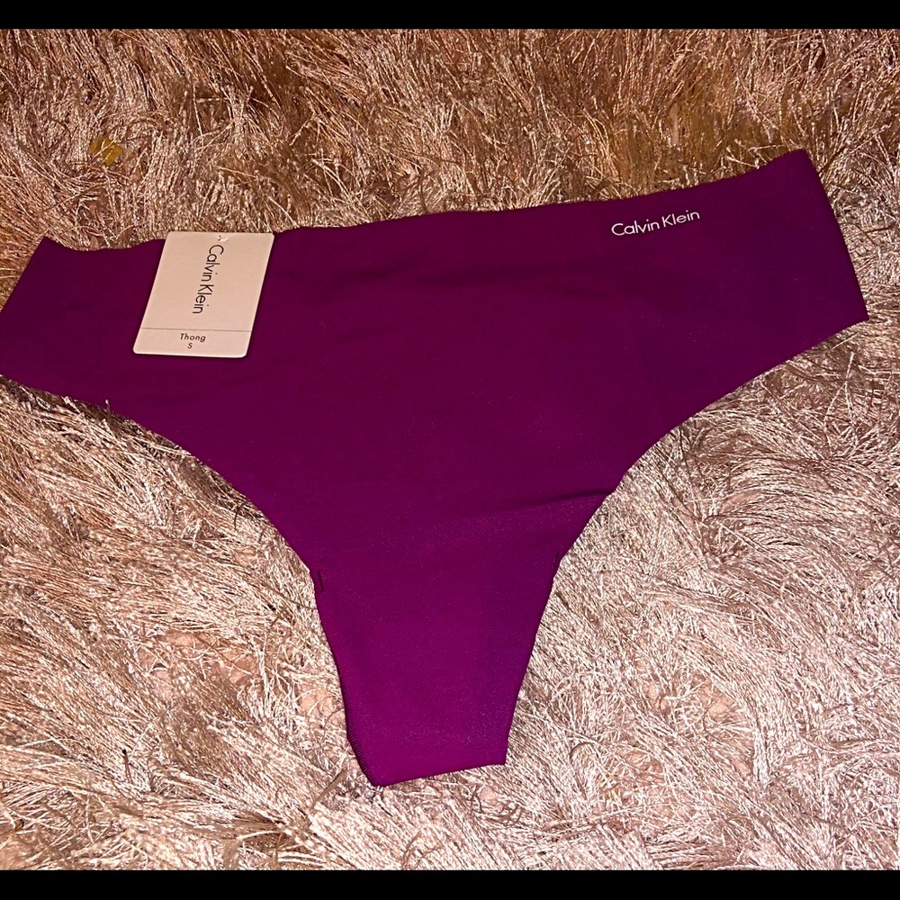 NWT- Calvin Klein Burgundy Thong- Small
